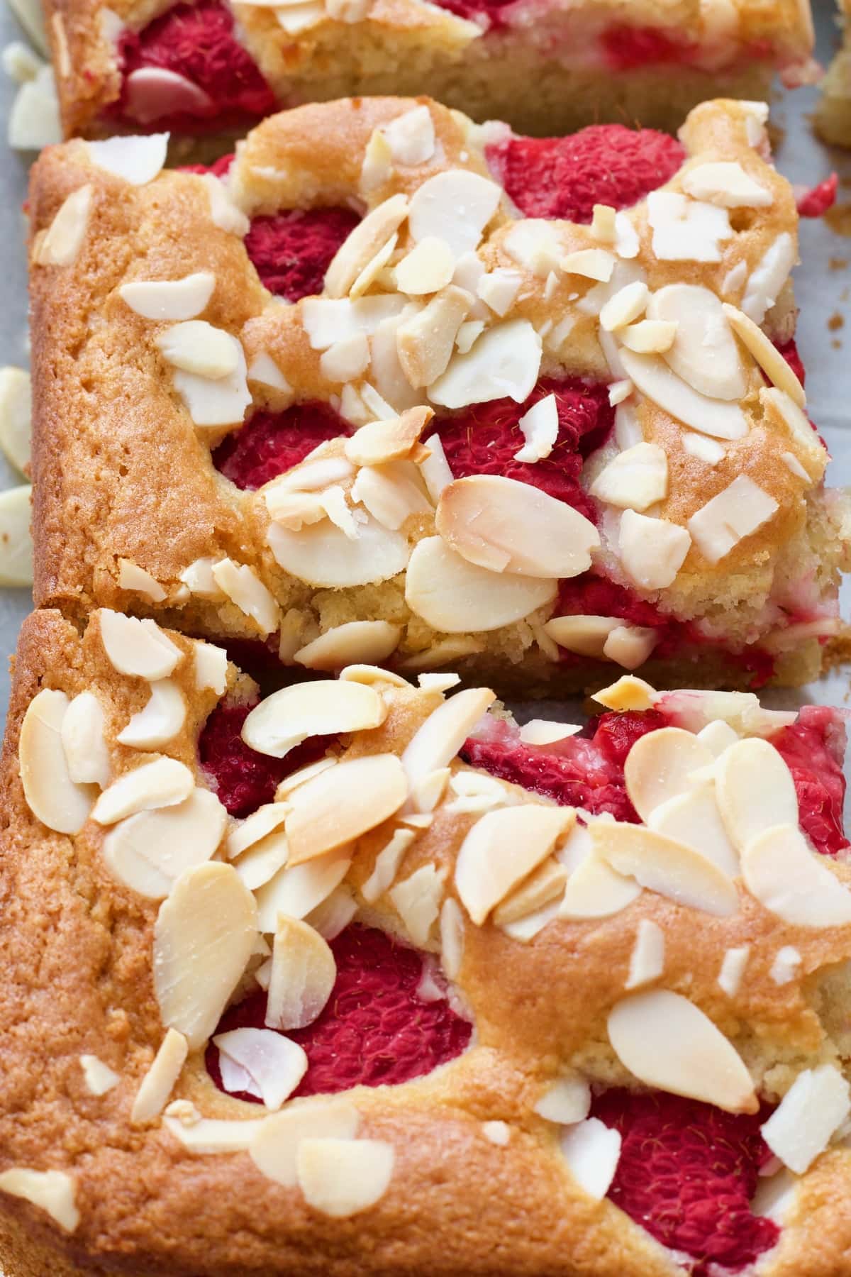 Close up of two slices of raspberry cake.