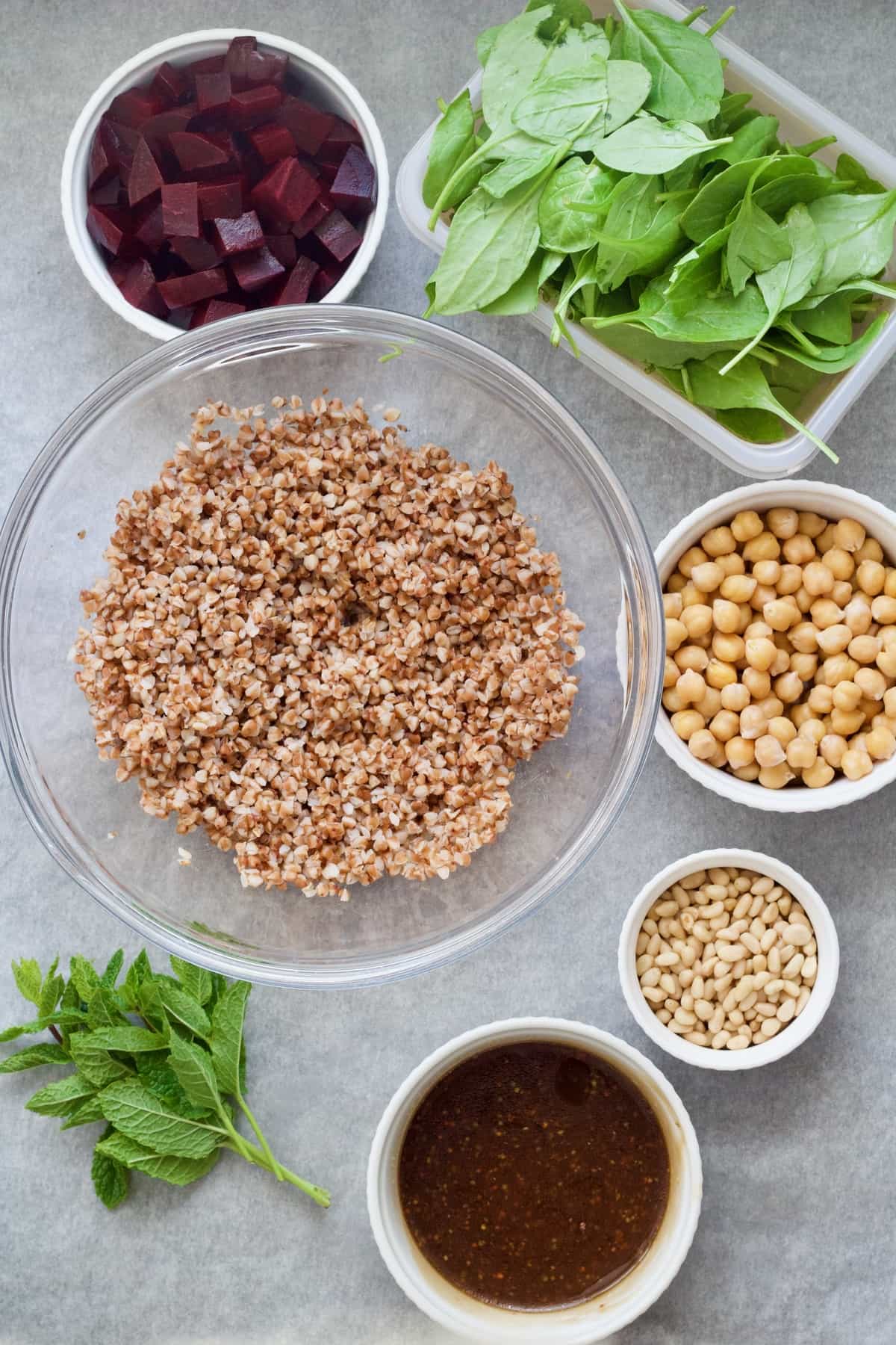 Salad ingredients in bowls.