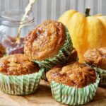 Close up of vegan pumpkin muffins glazed with plum jam.