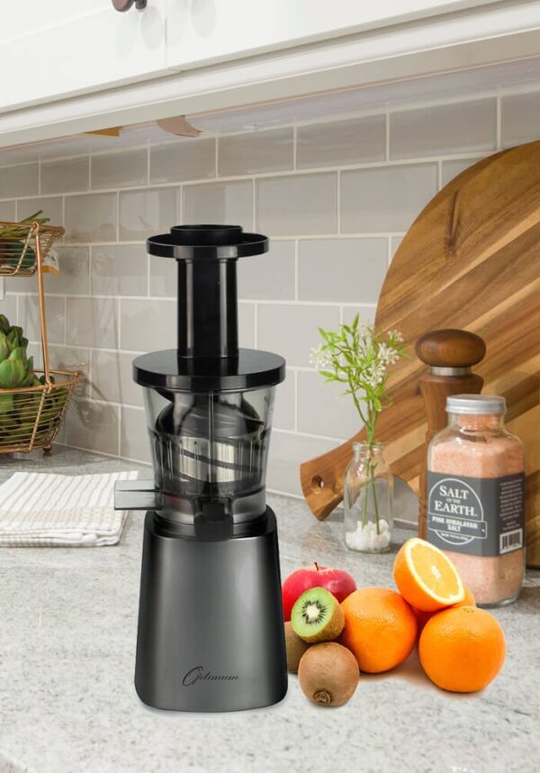 Black juicer on a kitchen counter.