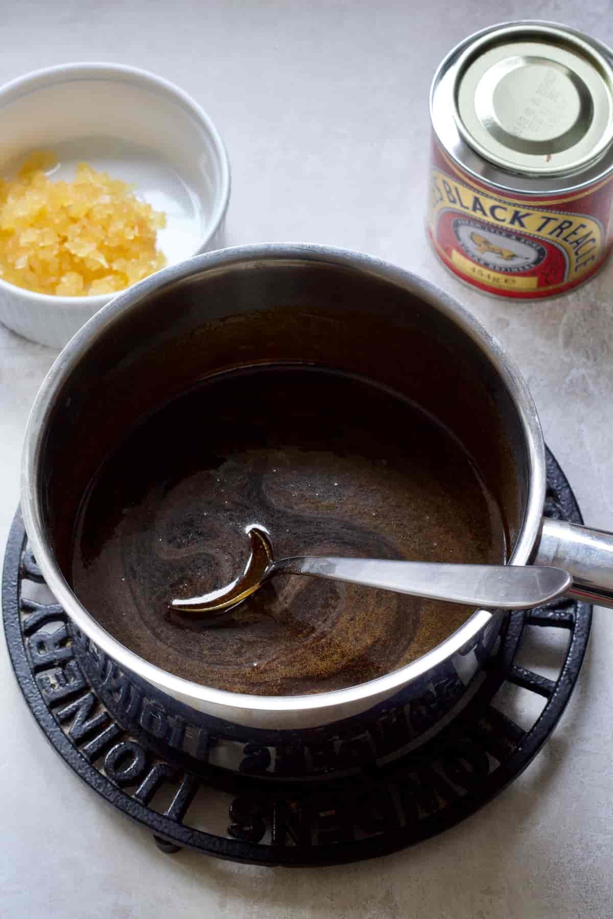 Dark liquid mixture in a pan.