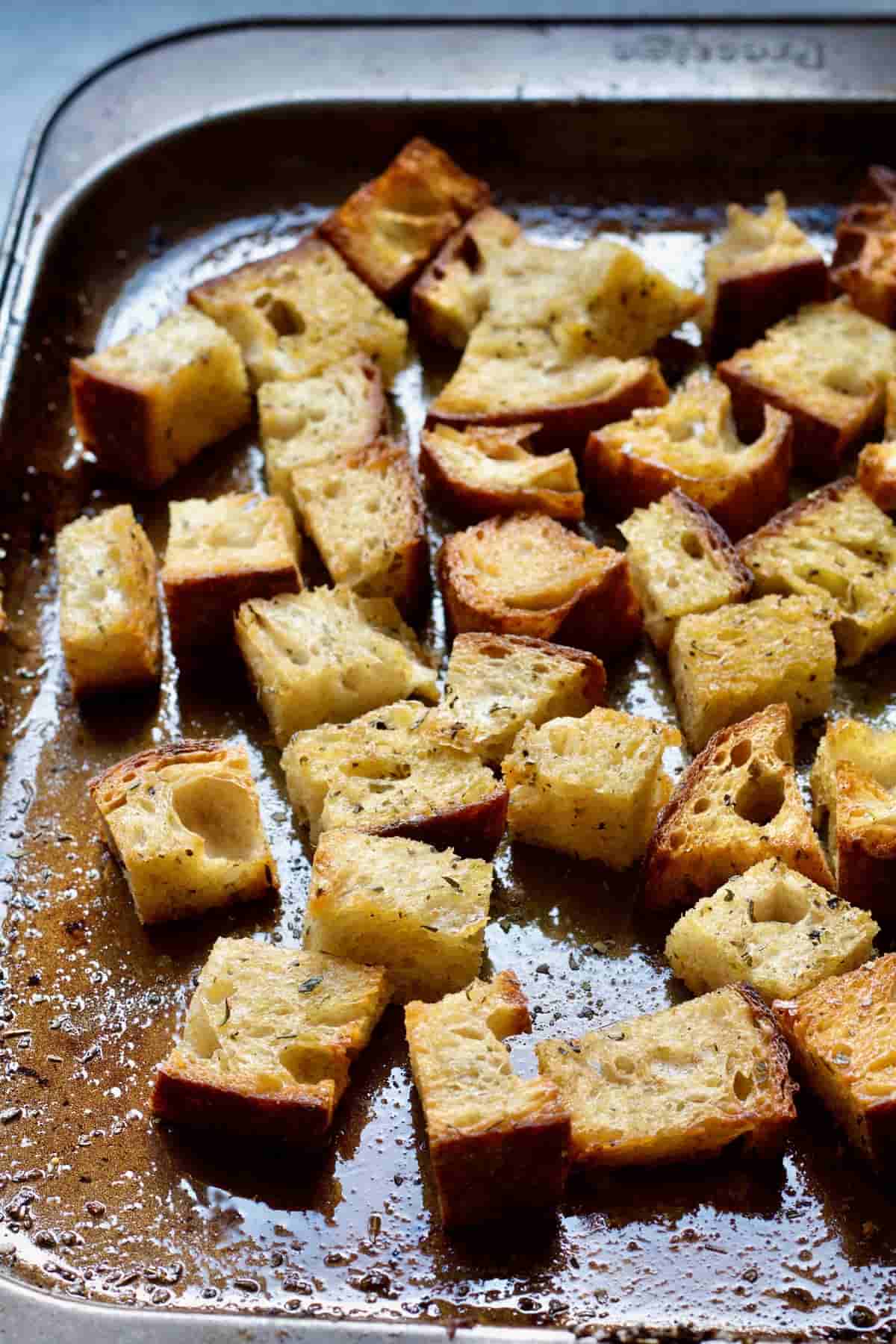 Croutons on a baking tray.