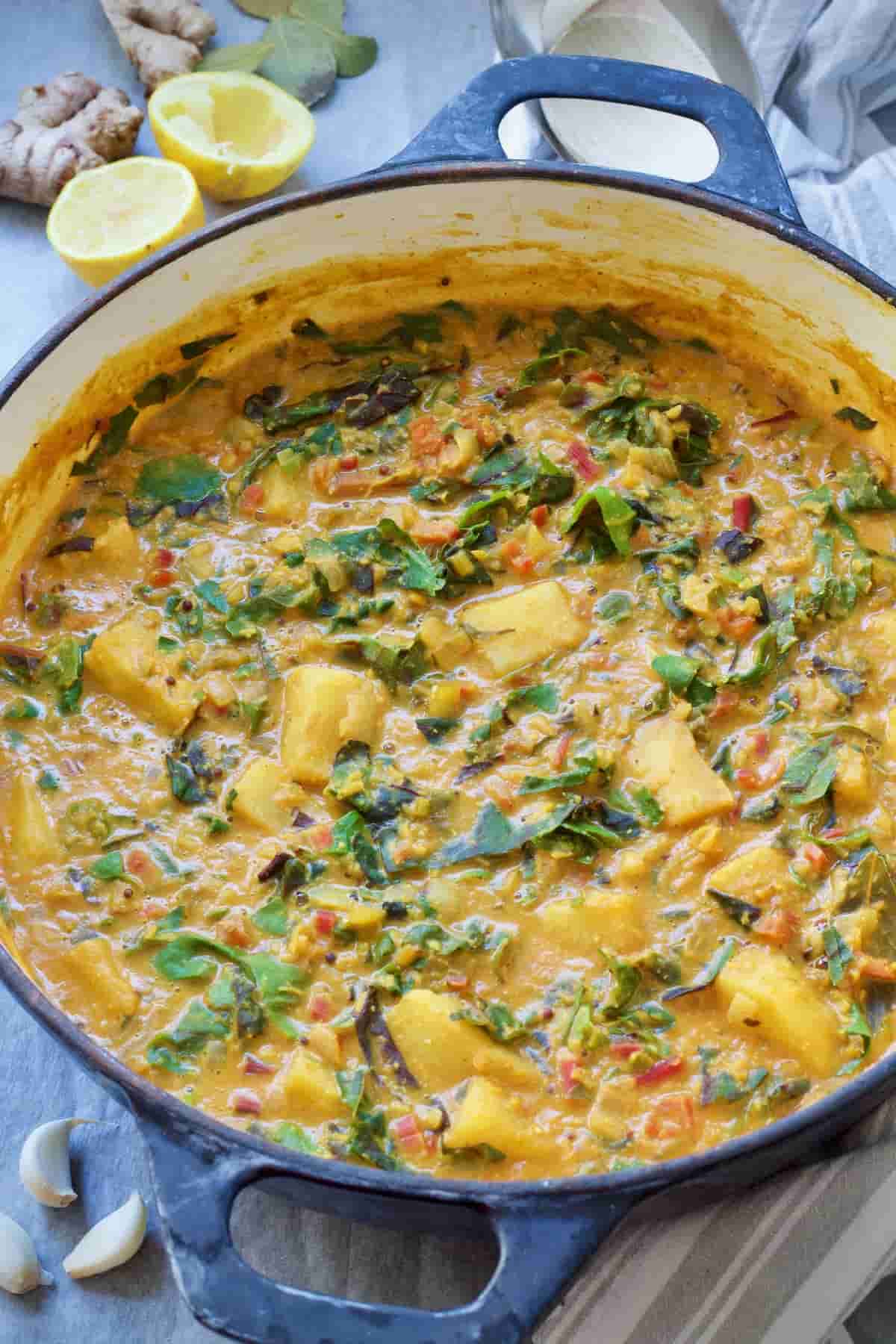 Large pot with celeriac & chard vegetable curry.