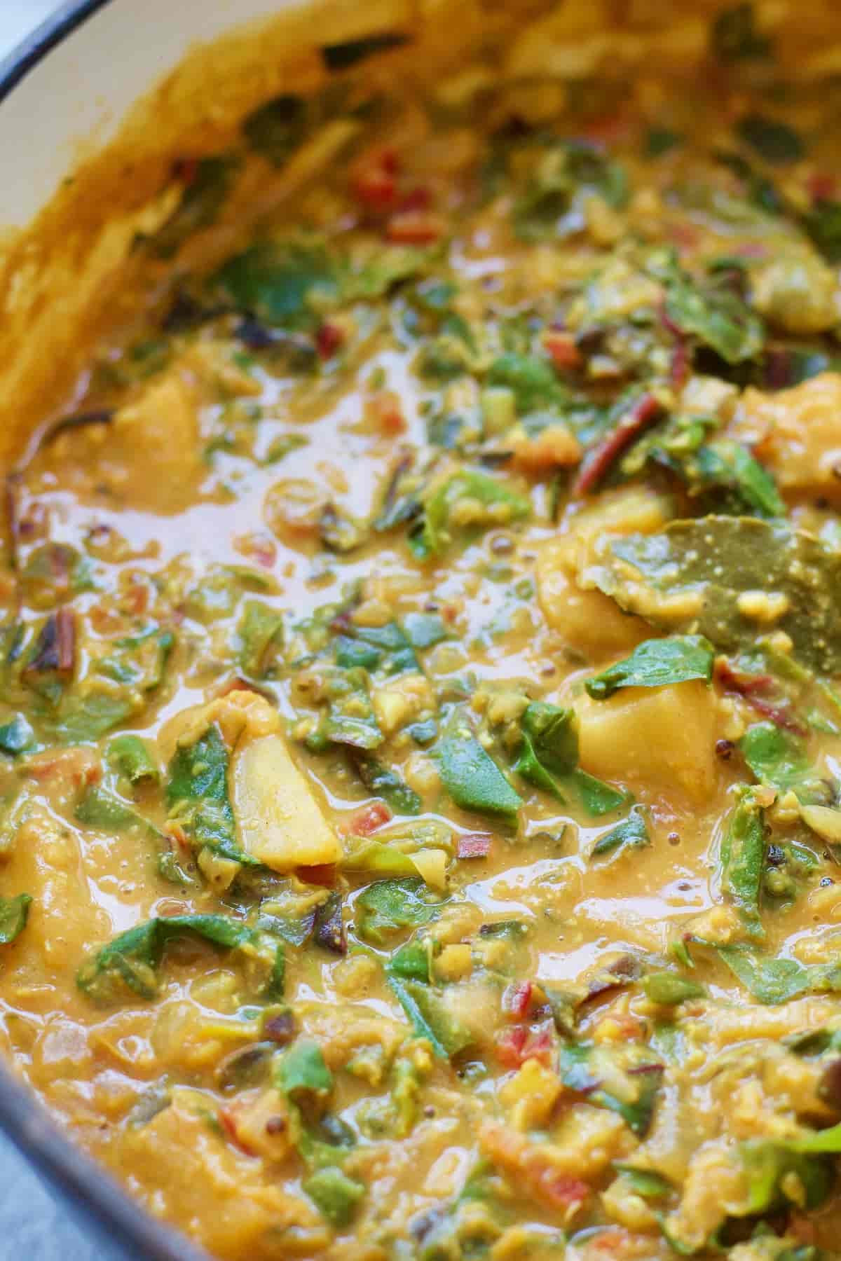 Close up shot of celeriac & chard vegetable curry.