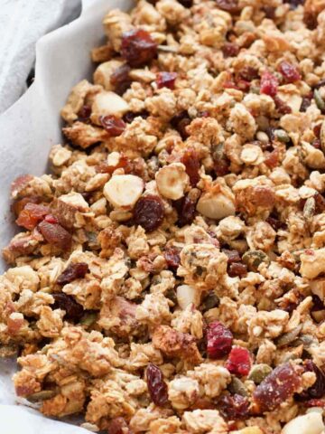 Baked homemade granola in a tray.