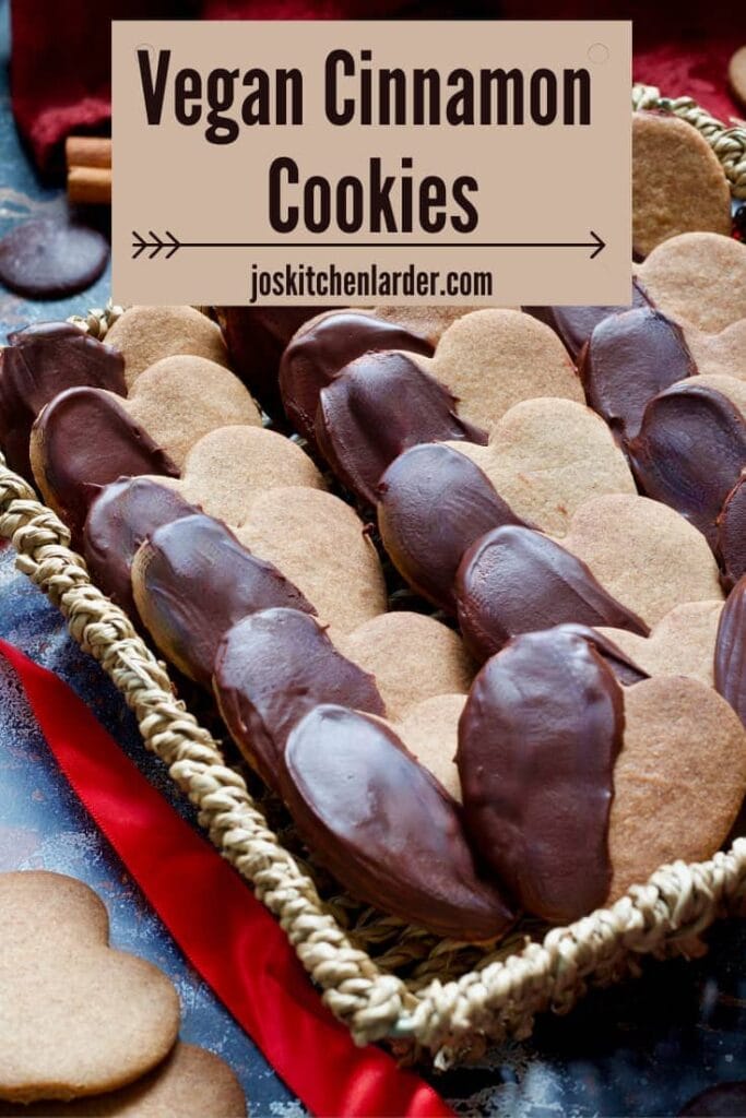 Chocolate covered cinnamon cookies in a basket (pin).