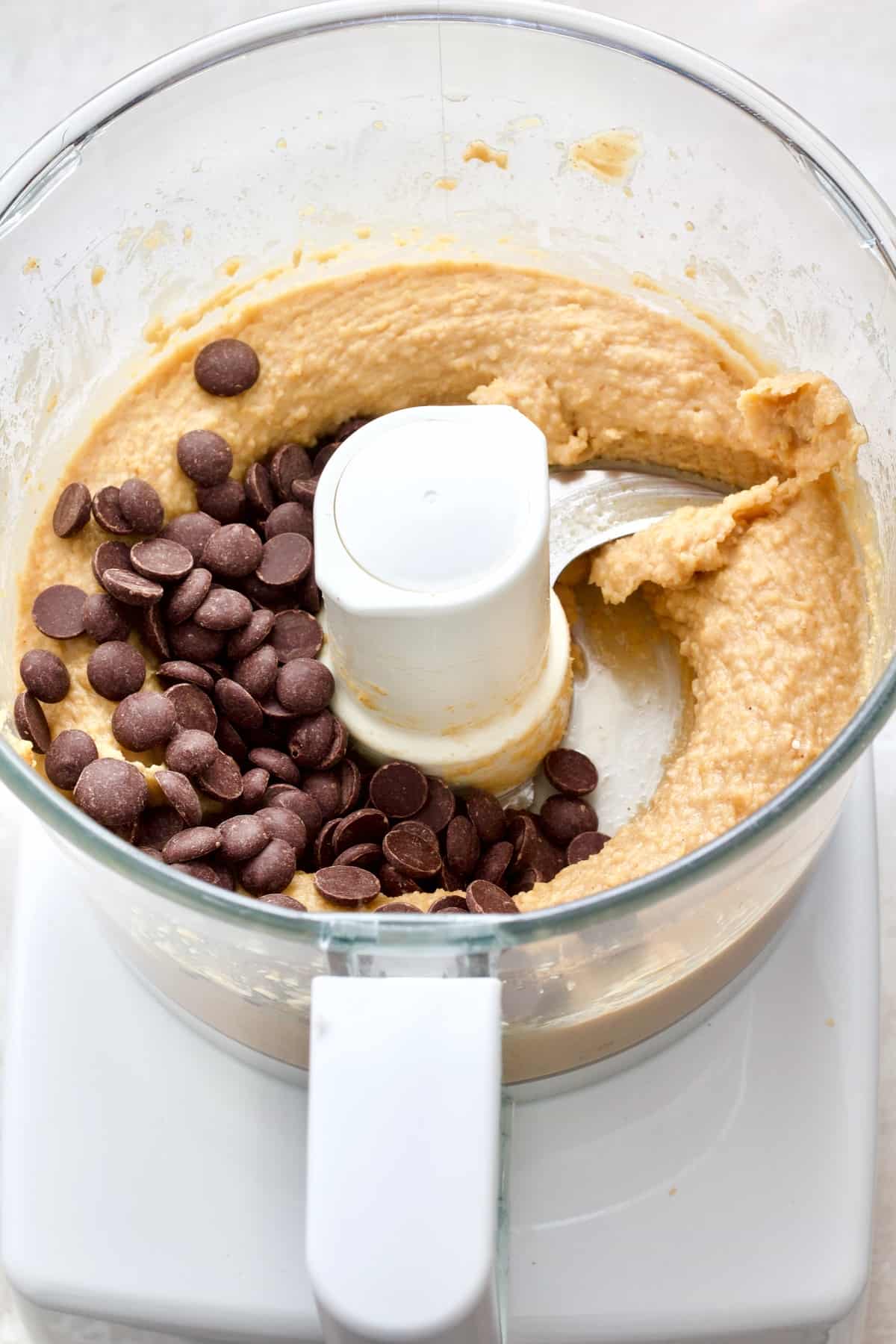 Chocolate chips added to blondie batter.