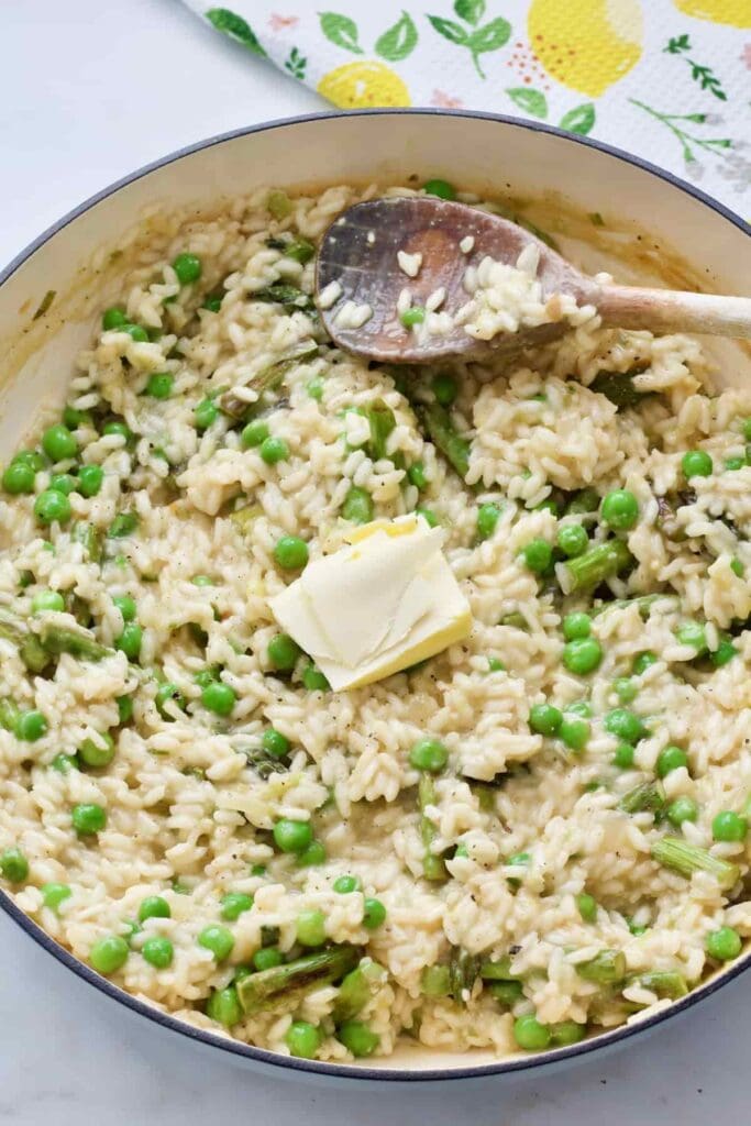 Chunk of butter on top of risotto.