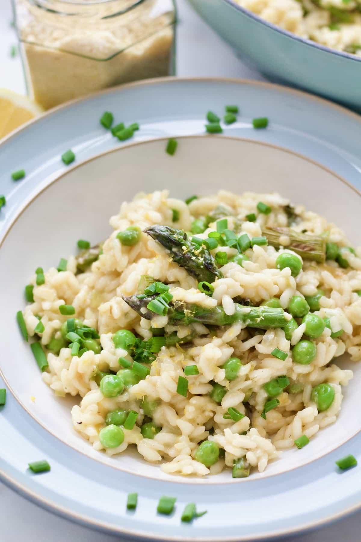 Bowl with asparagus risotto, sprinkled with chives.