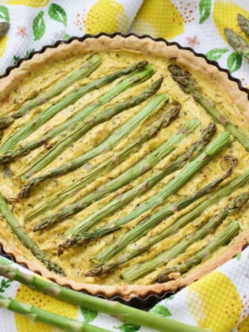 Baked vegan quiche with asparagus.