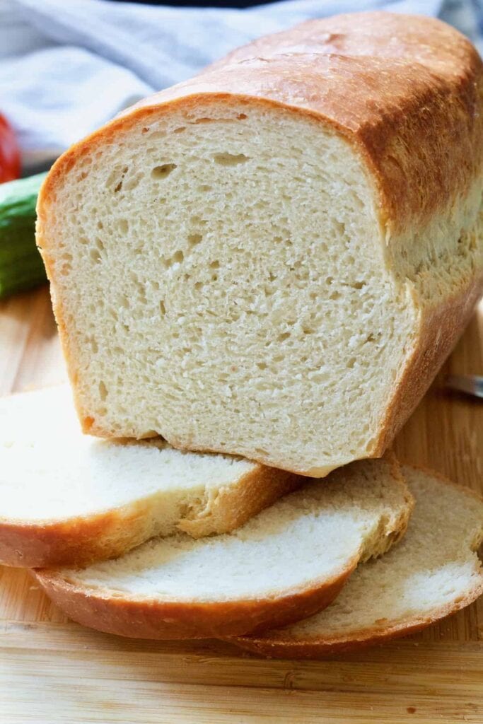 Cut white sandwich bread on top of 3 slices.