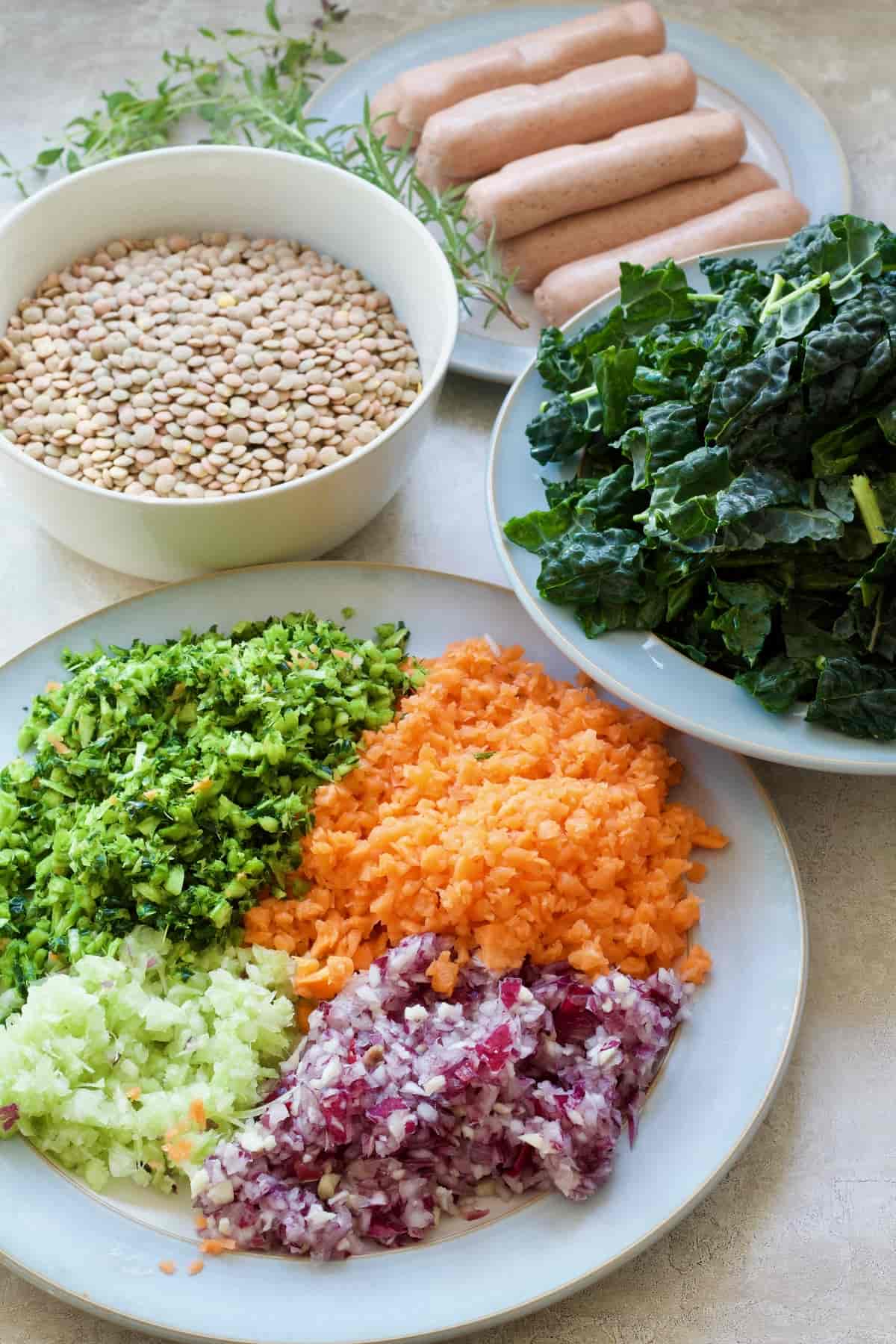 Lentils, vegan sausages, cavolo nero and finely chopped veggies.