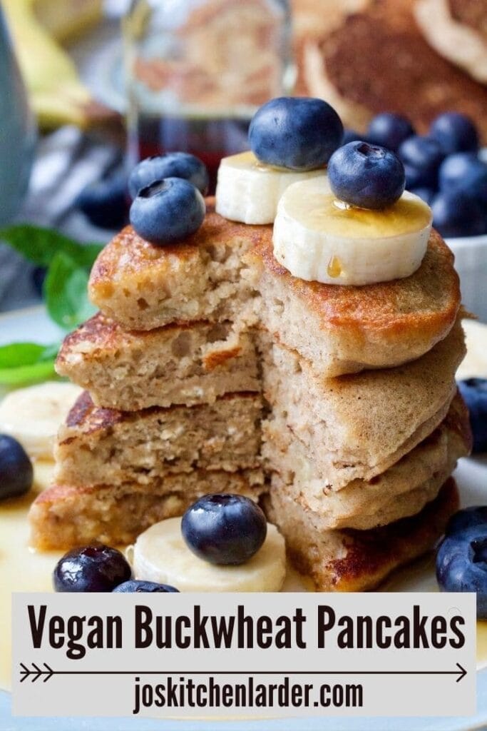 Stack of vegan buckwheat pancakes with portion cut out.