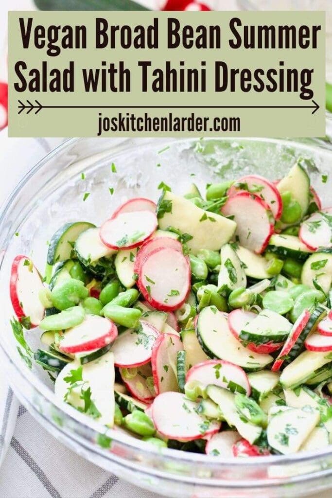 Close up of broad bean summer salad in a glass bowl.