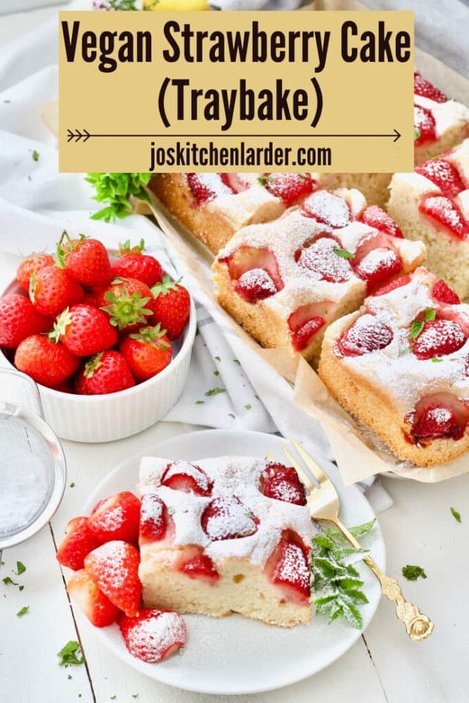 Fresh strawberry yogurt cake, slice on a plate and bowl with strawberries.