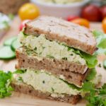 Close up of vegan egg salad sandwich stack.