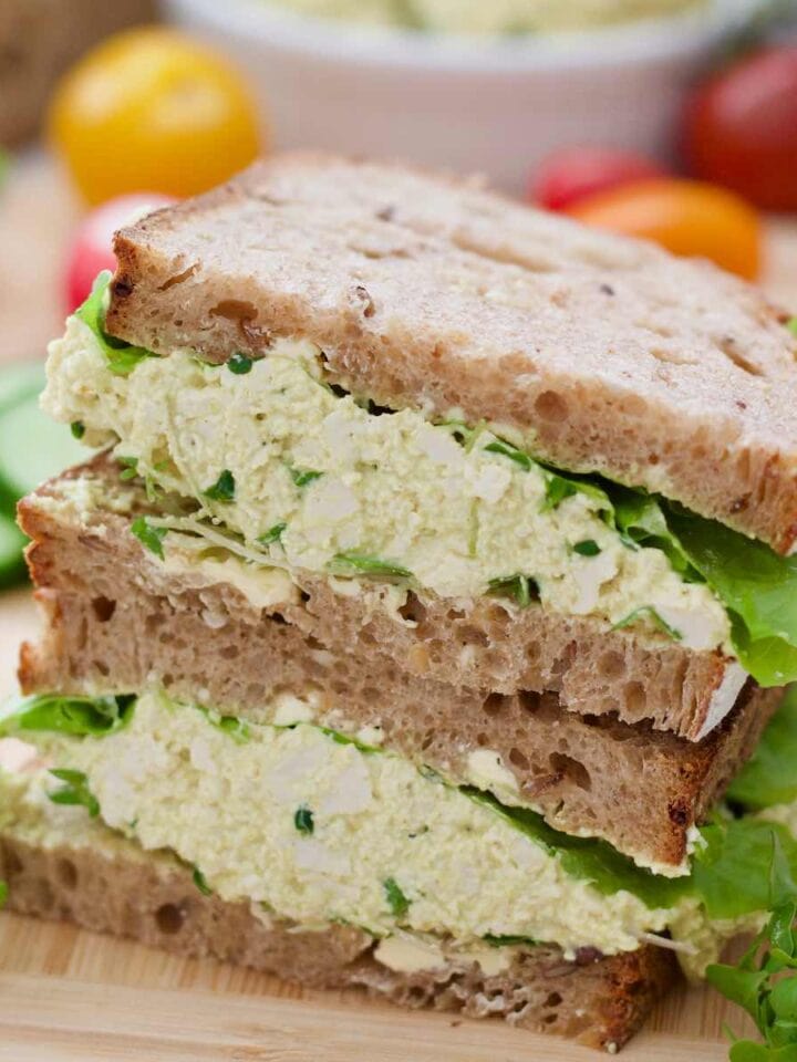 Close up of vegan egg salad sandwich stack.