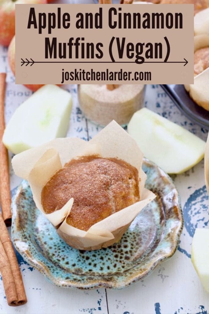 Wrapped vegan apple muffin on a plate.