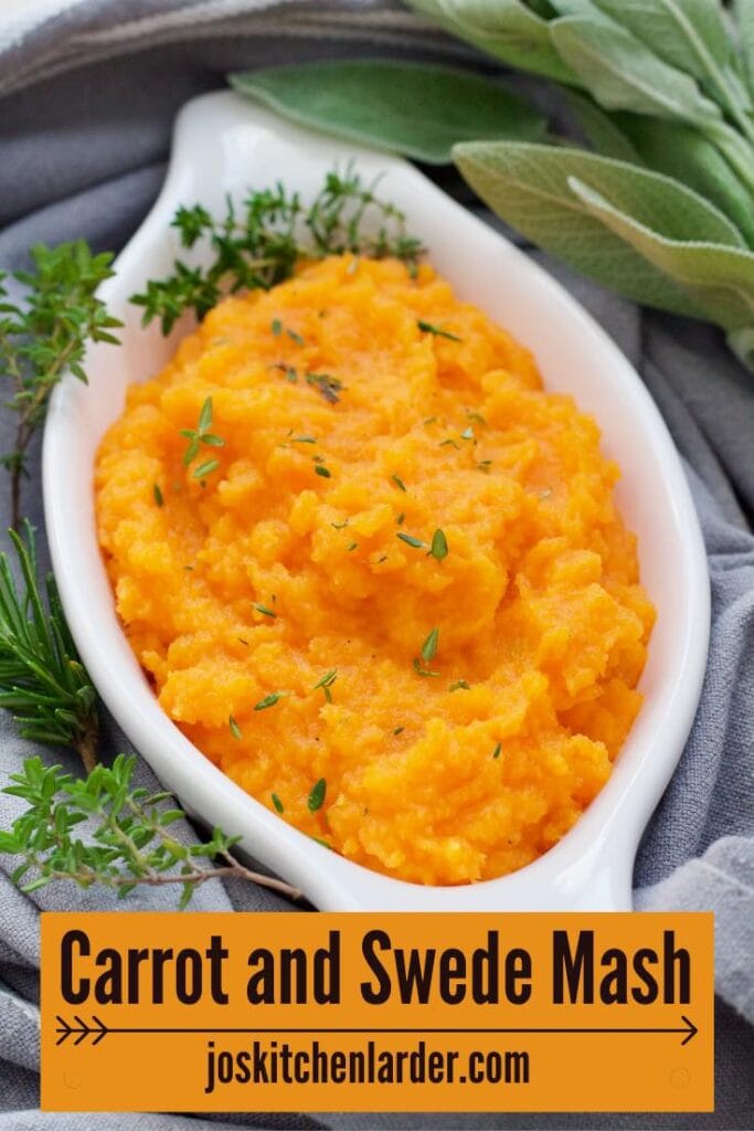 Carrot and swede mash in a serving dish.