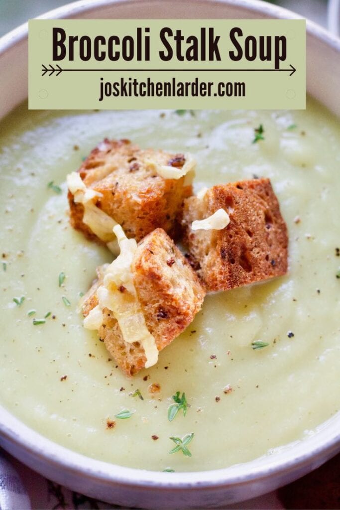 Close up of broccoli stalk soup and croutons.