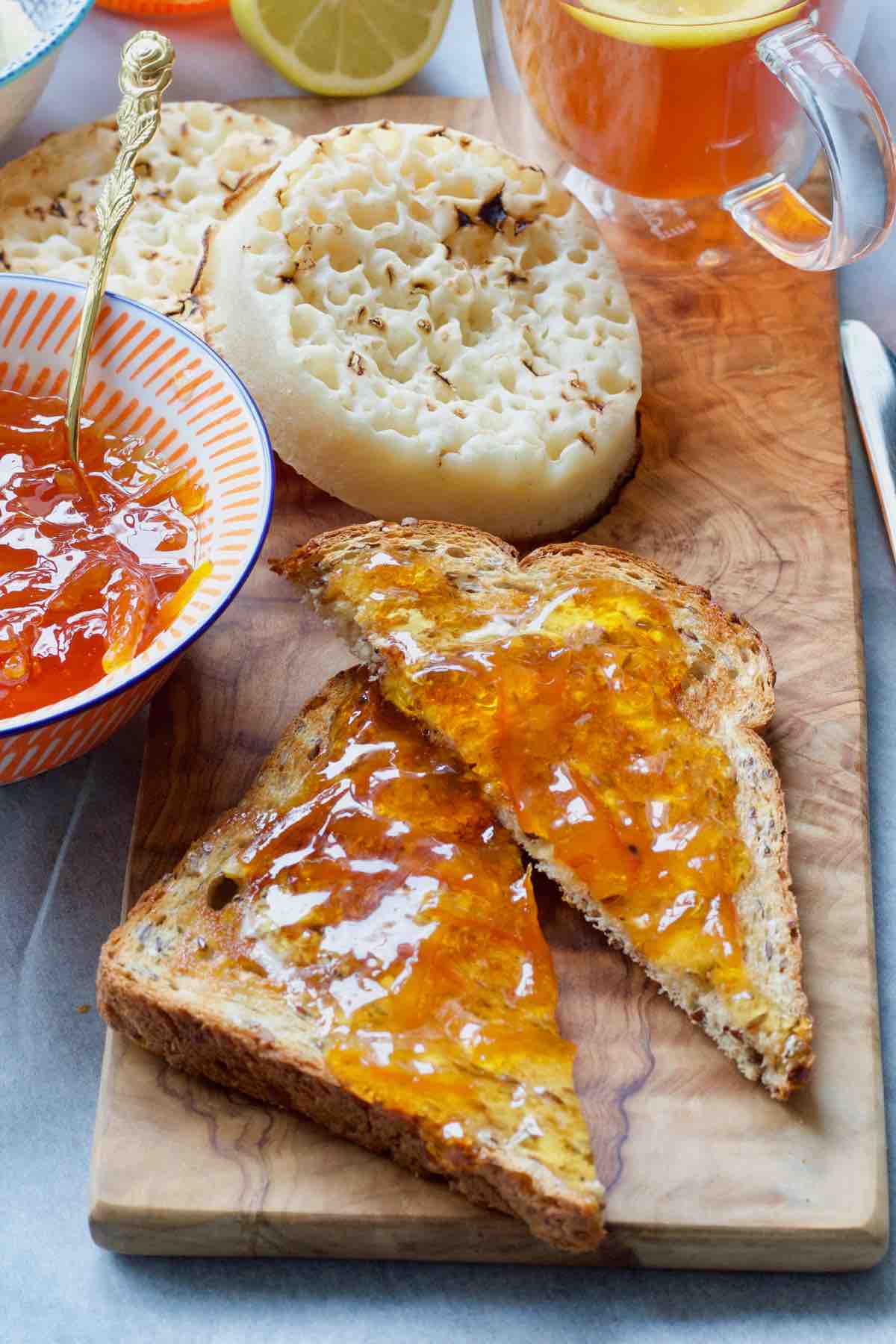 Two pieces of toast with marmalade.
