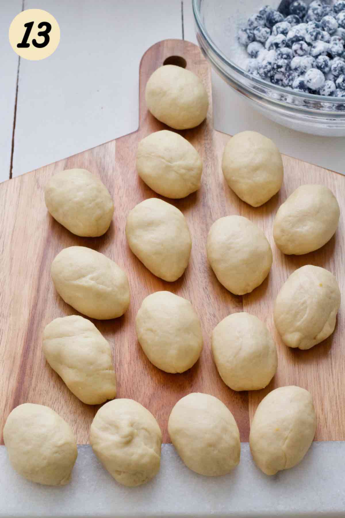 16 pieces of dough ready for filling.