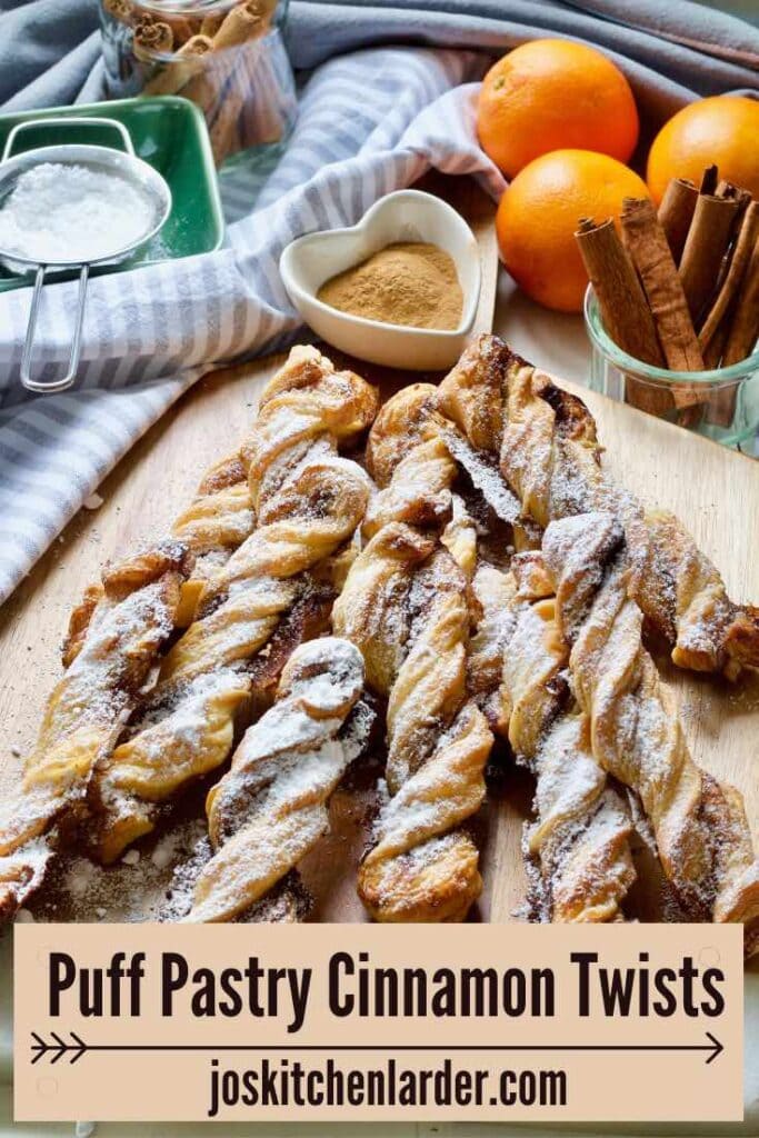 Puff pastry cinnamon twists on the board.