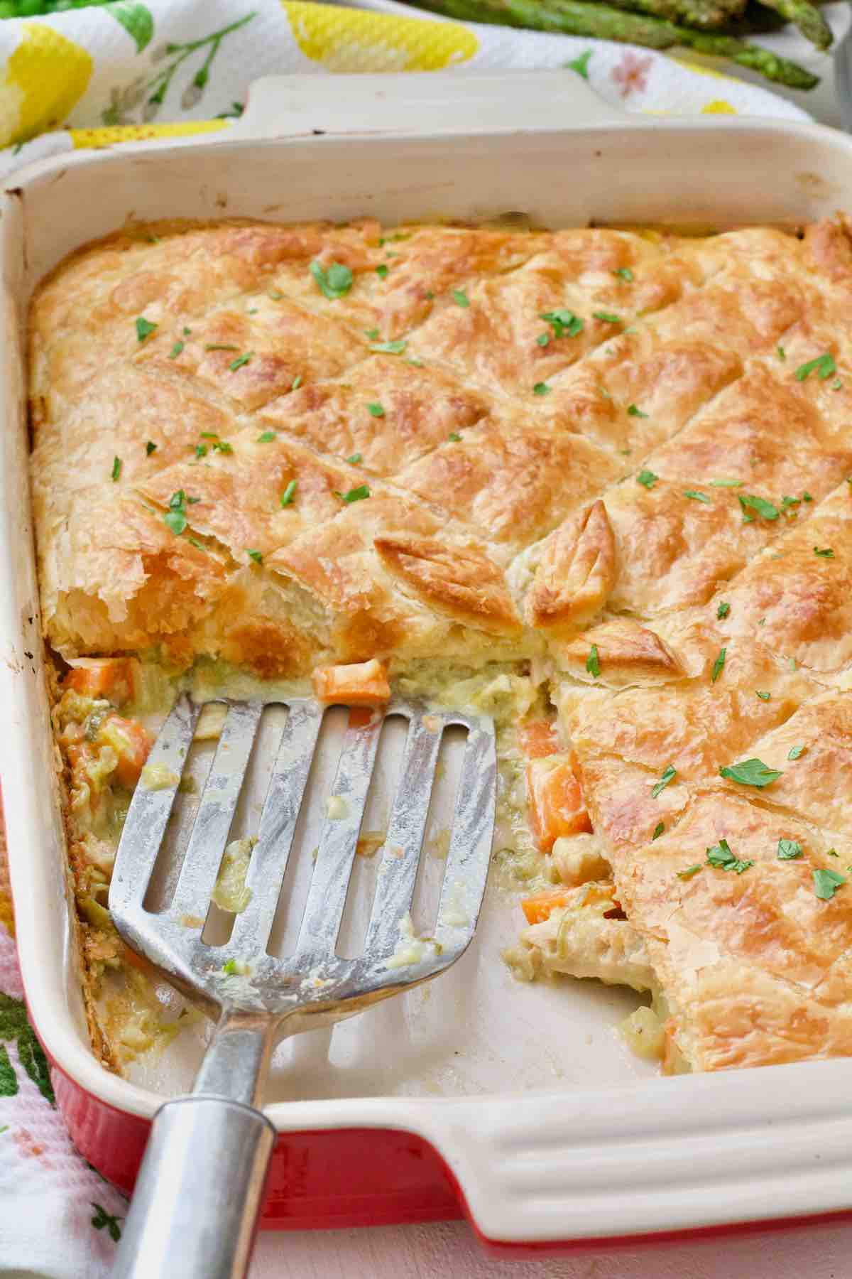 Quorn chicken pie with portion taken out and spatula in its place.