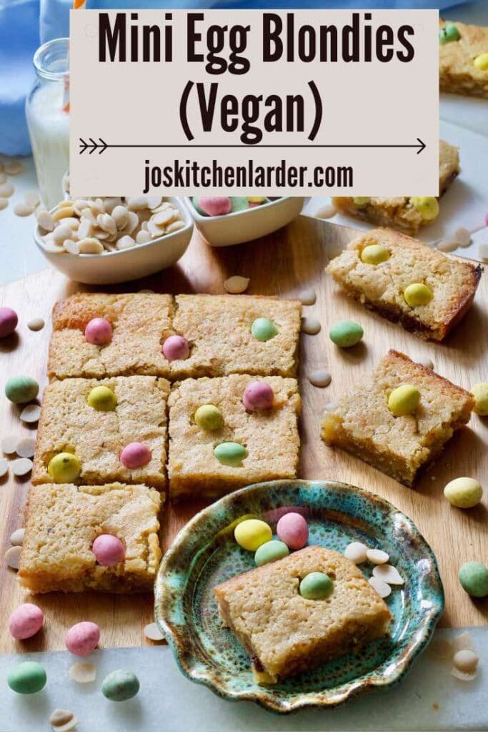 Blondies on a board and one small on a plate.