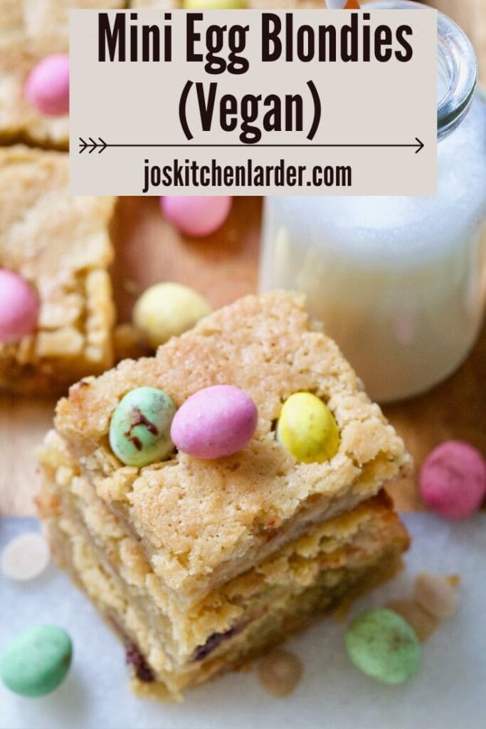 Piled up mini egg blondies and bottle with plant milk.