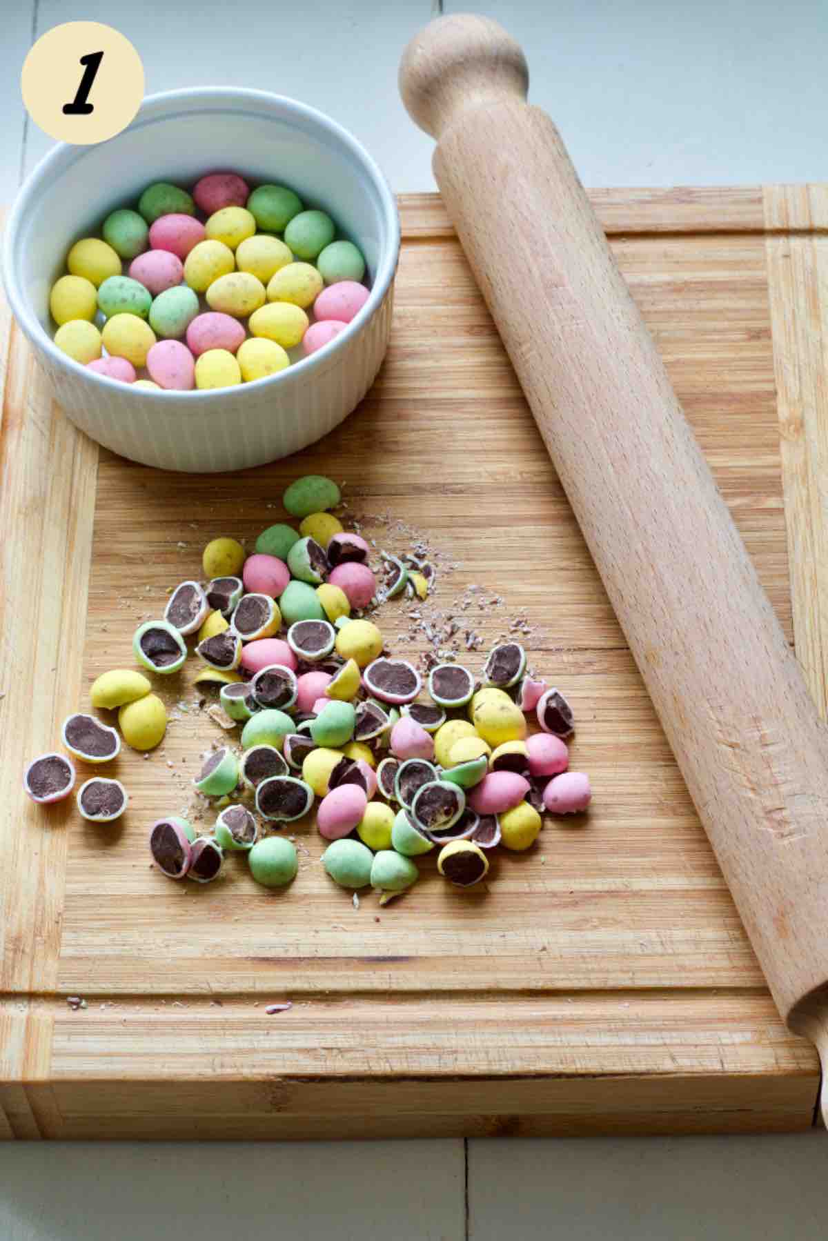 Crushed and whole mini eggs and rolling pin.