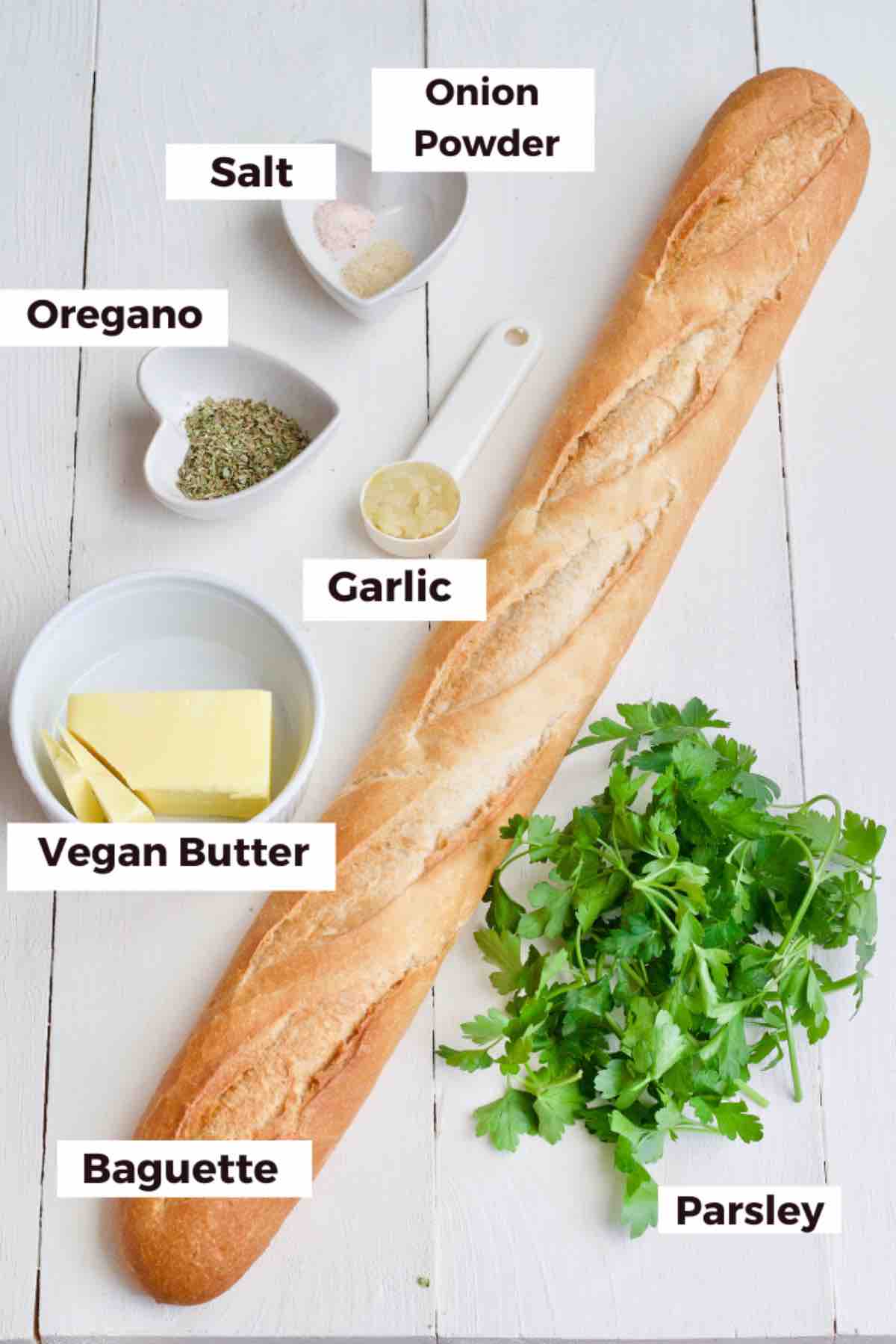 Ingredients for making vegan garlic bread.