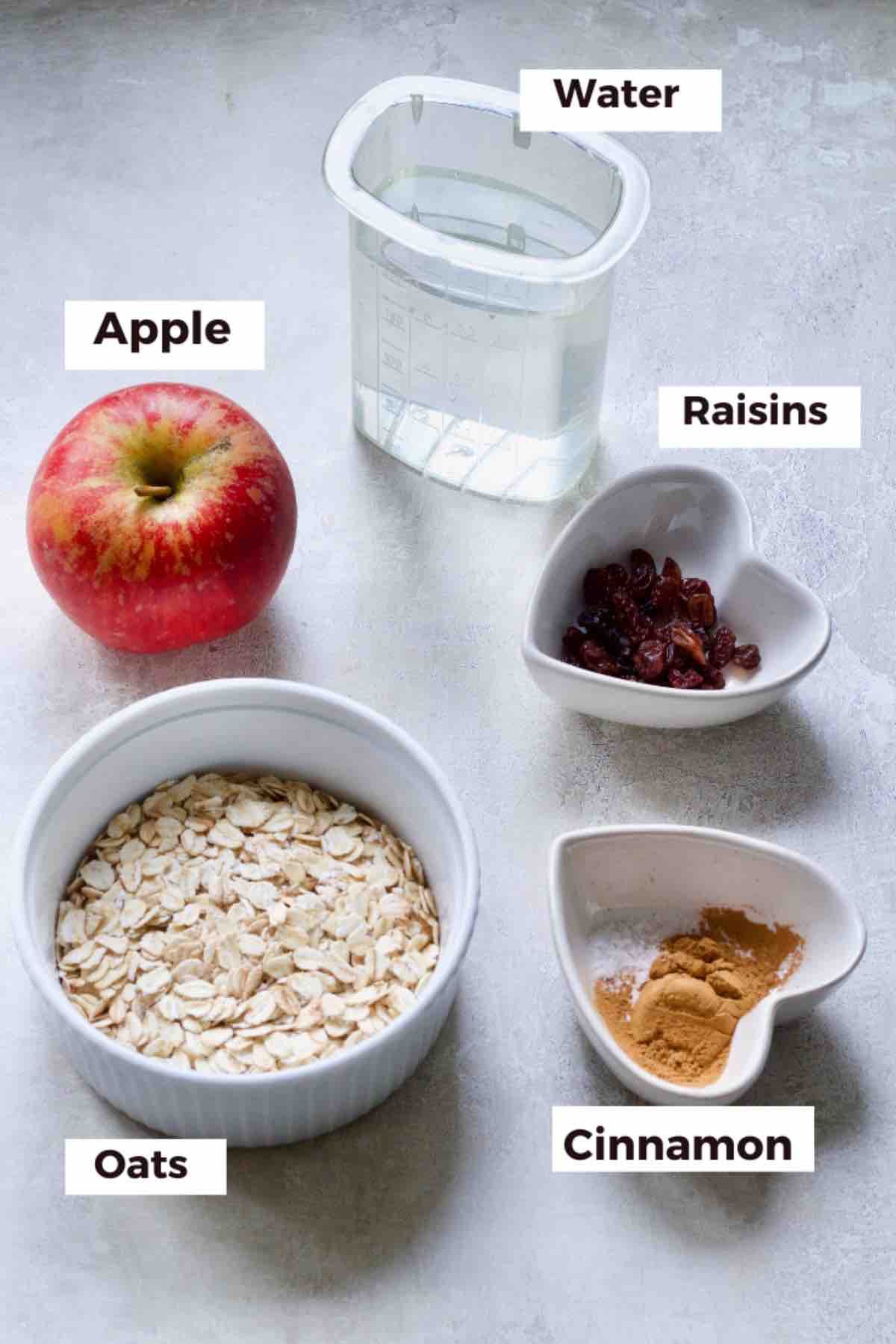 Ingredients for making apple and cinnamon porridge.