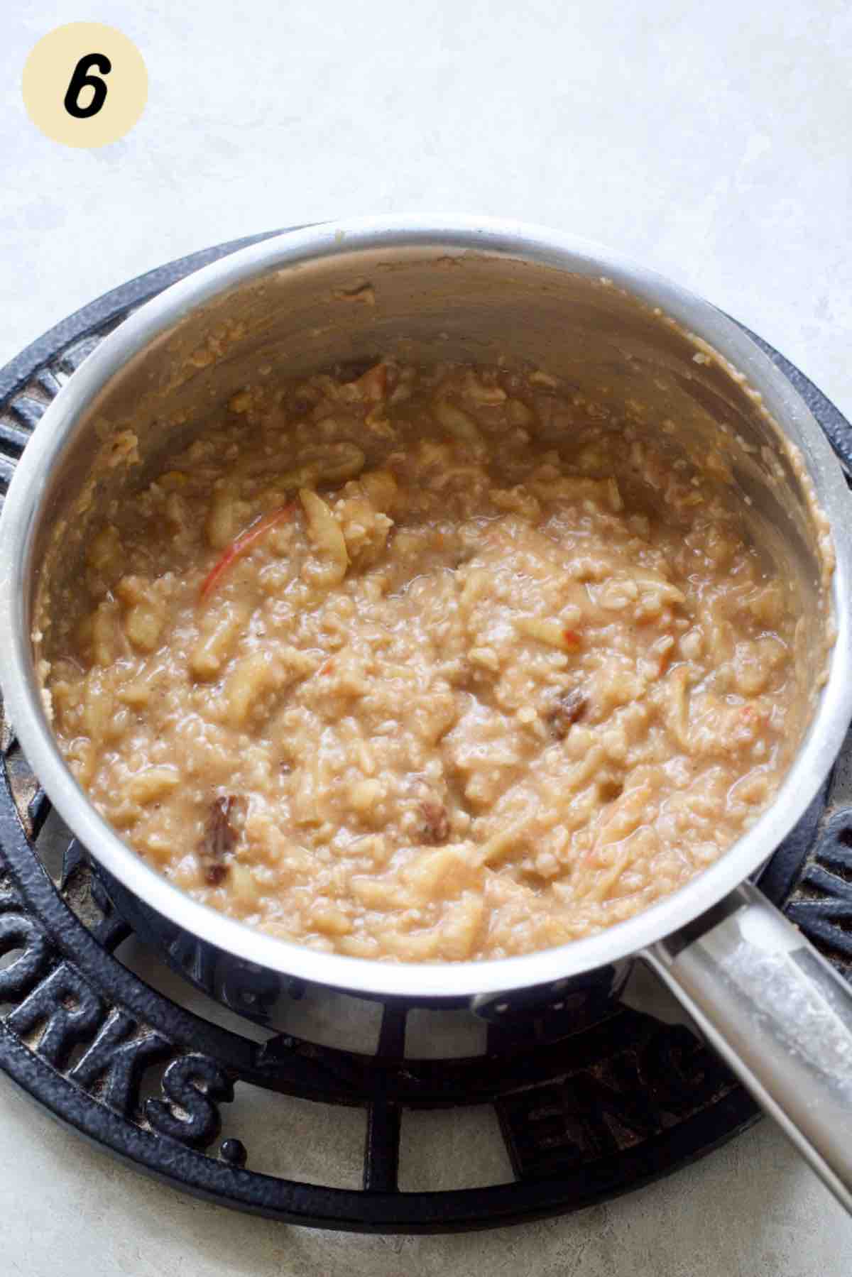 Cooked porridge in a pan.