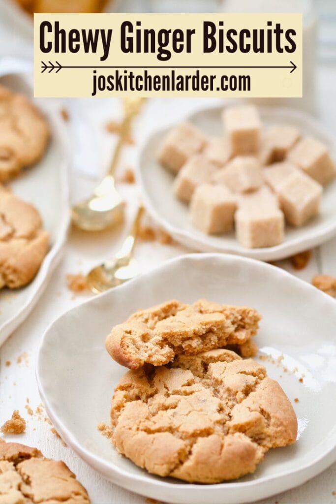 Small plate with ginger cookies and sugar cubes in the background.