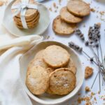 Close up of ginger shortbread biscuits in a bowl.