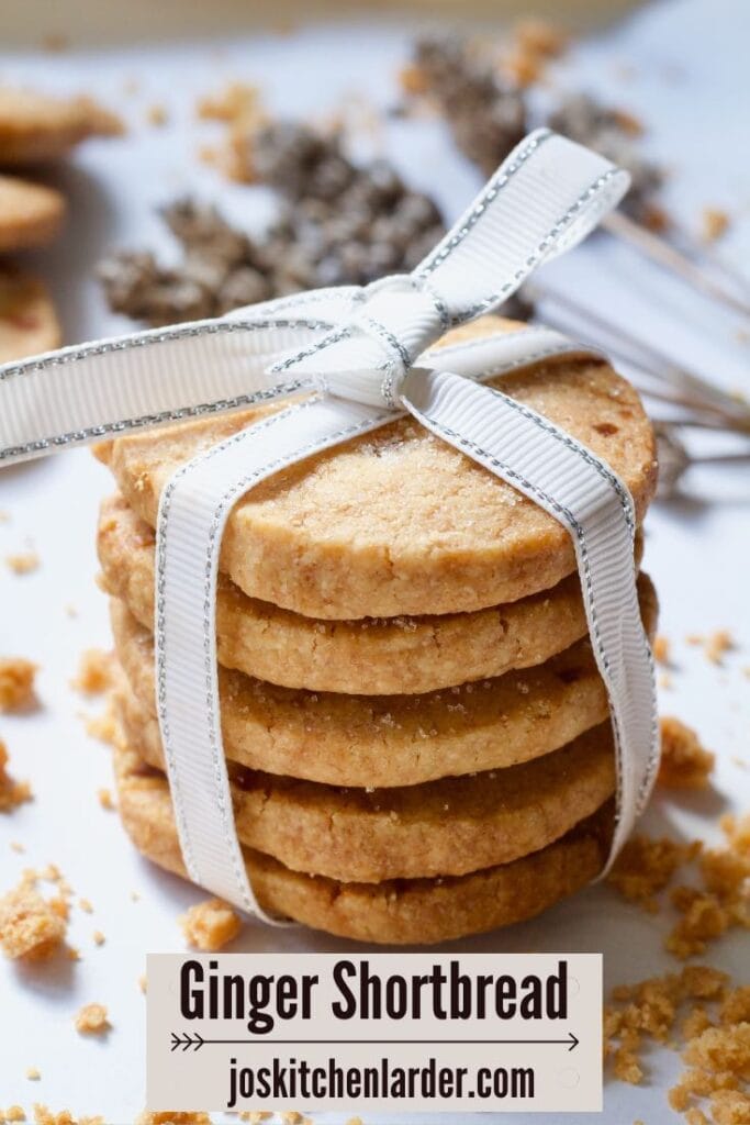 Stack of ginger shortbread tied with a ribbon.