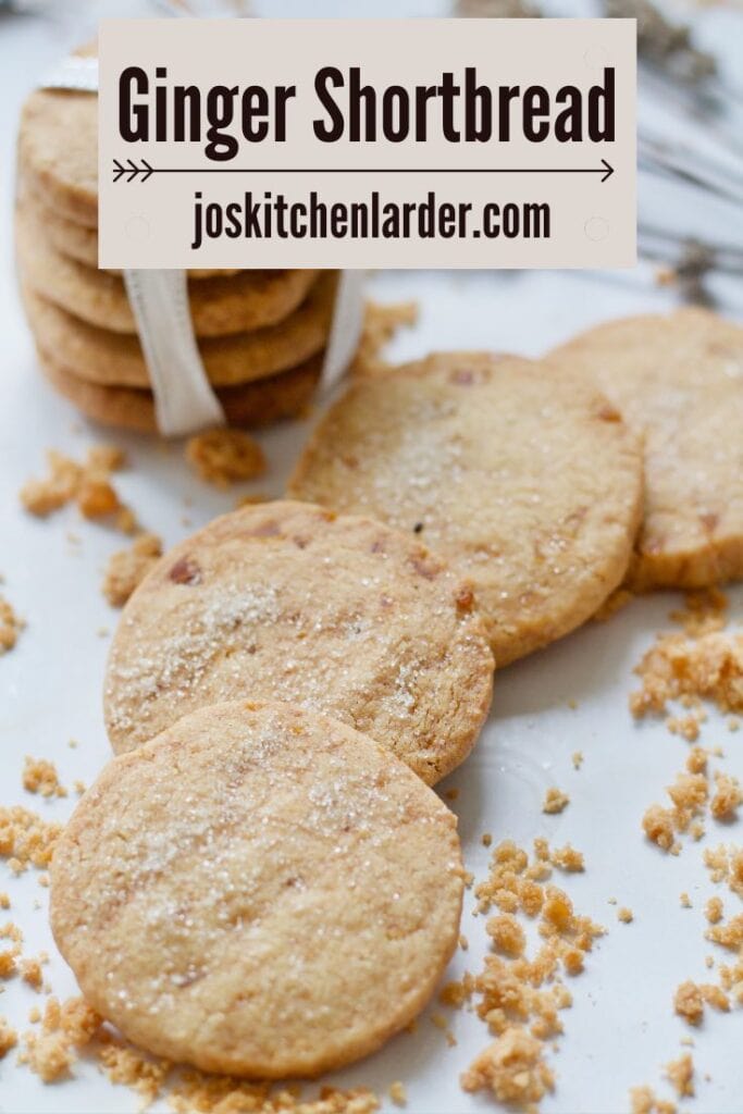 Shortbread rounds with crumbs around them.