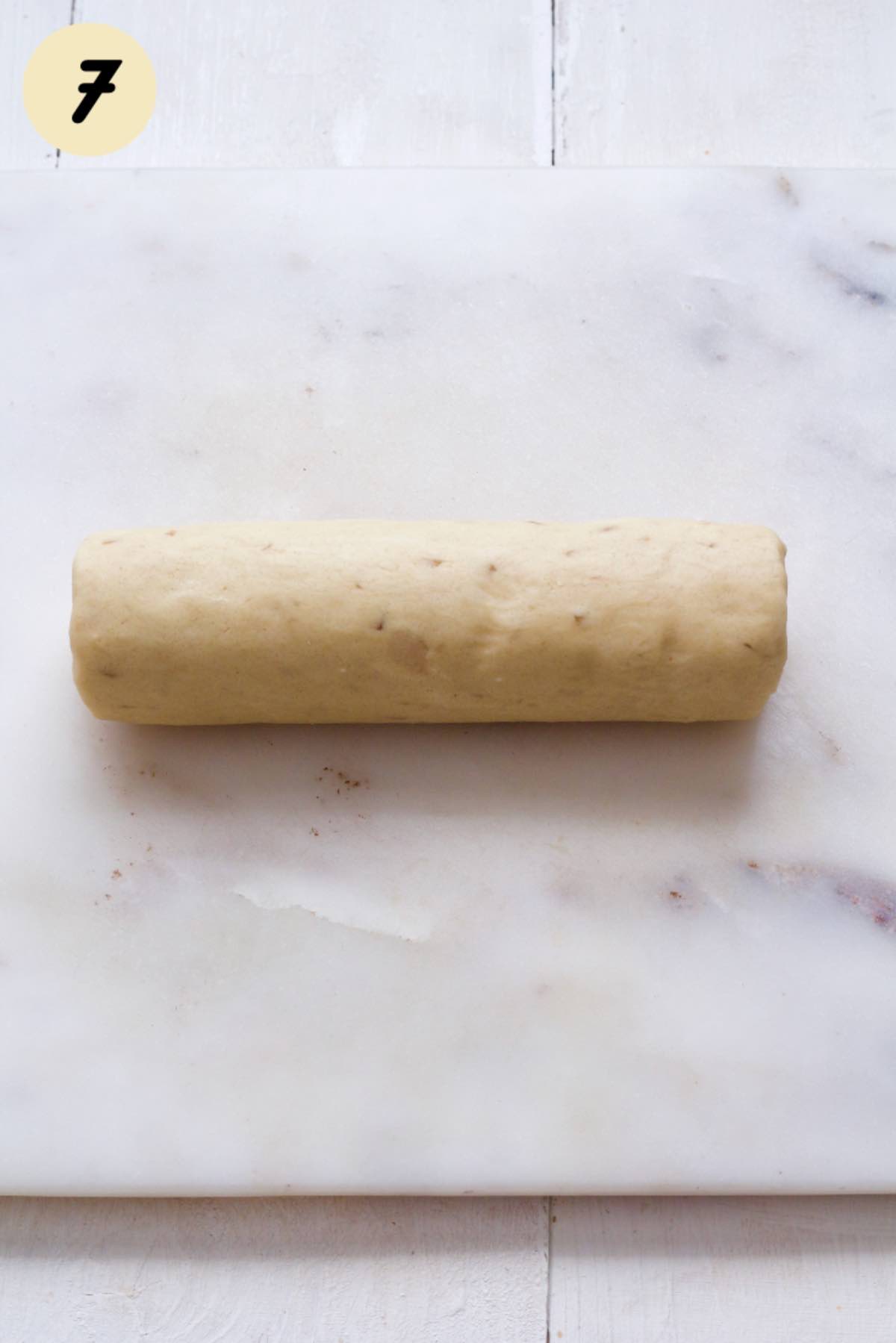 Shortbread dough shaped into a log.