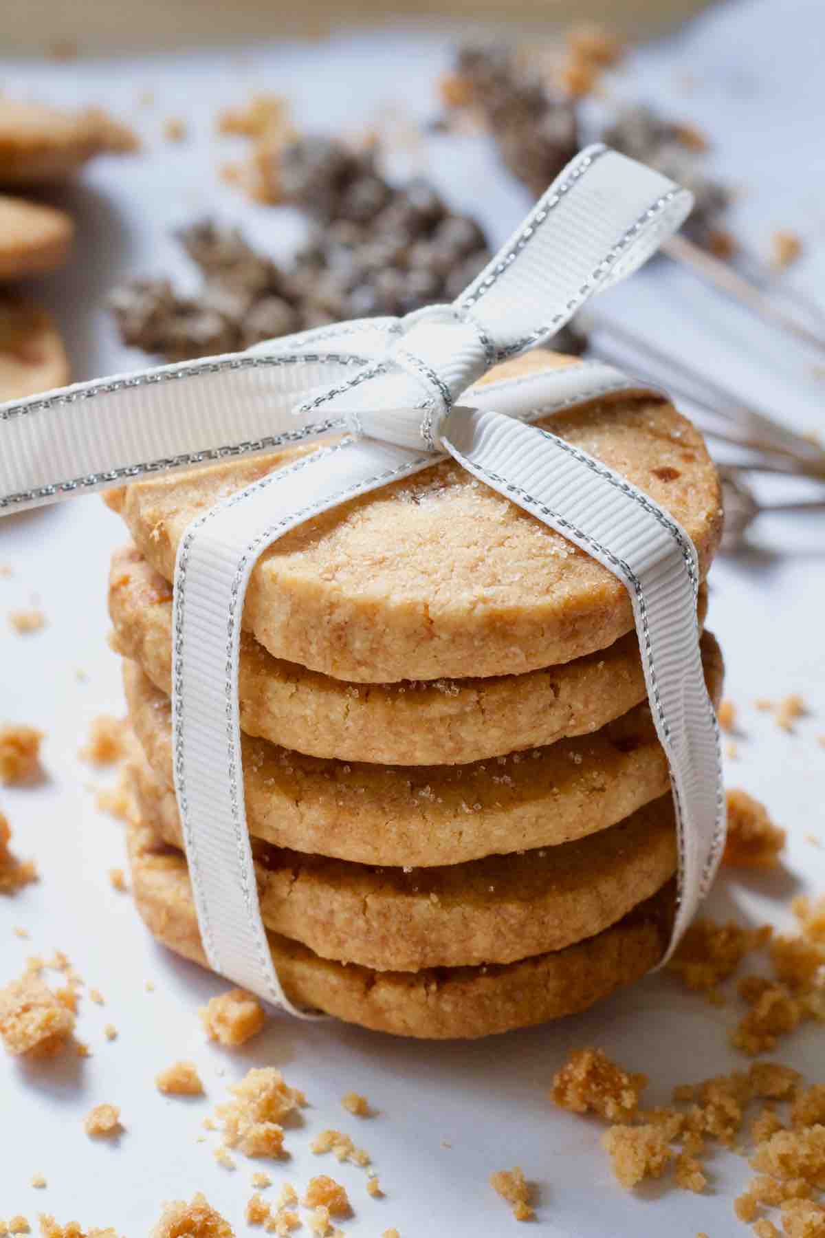 Stack of ginger shortbread tied with a ribbon.