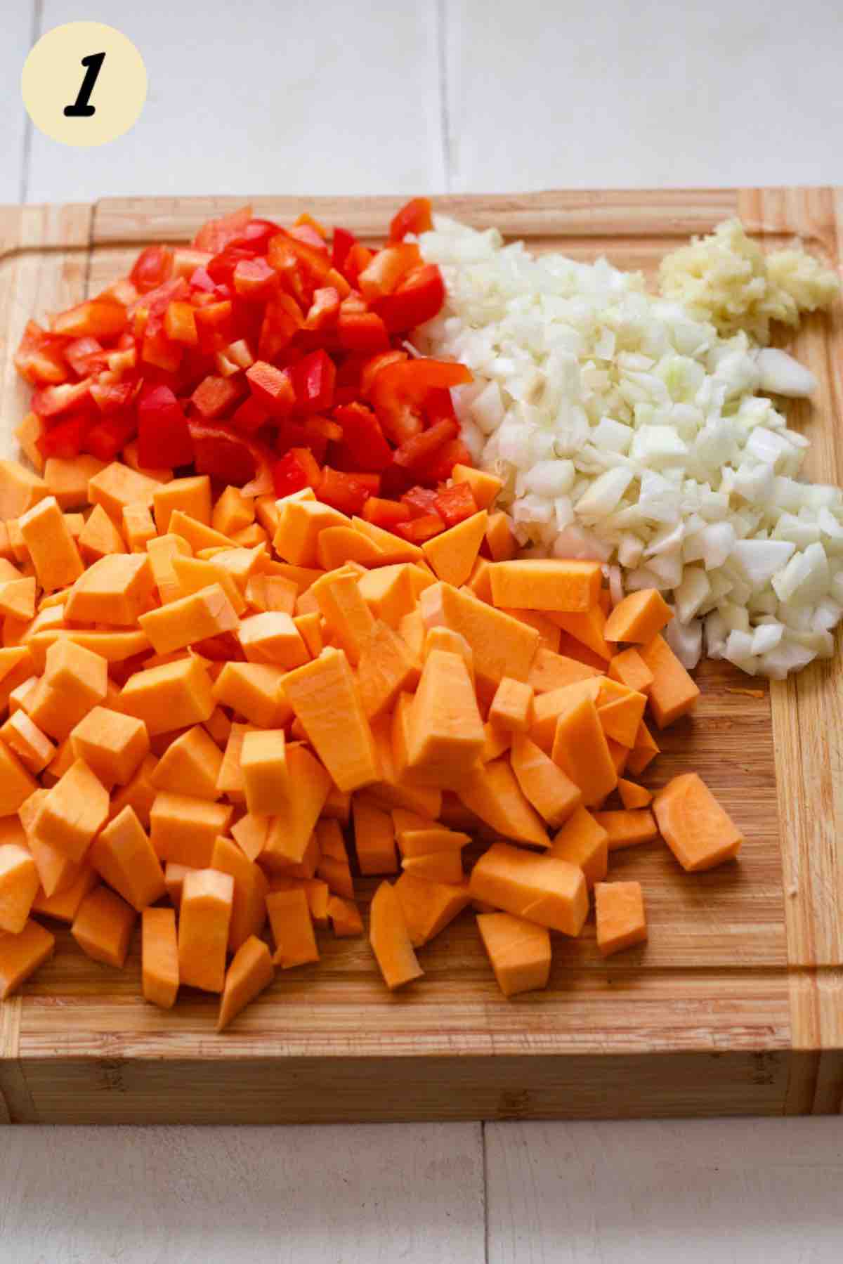 Chopped up vegetables on the board.