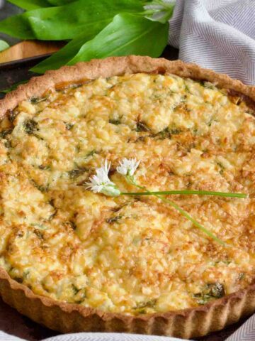 Close up of cheese and onion quiche.