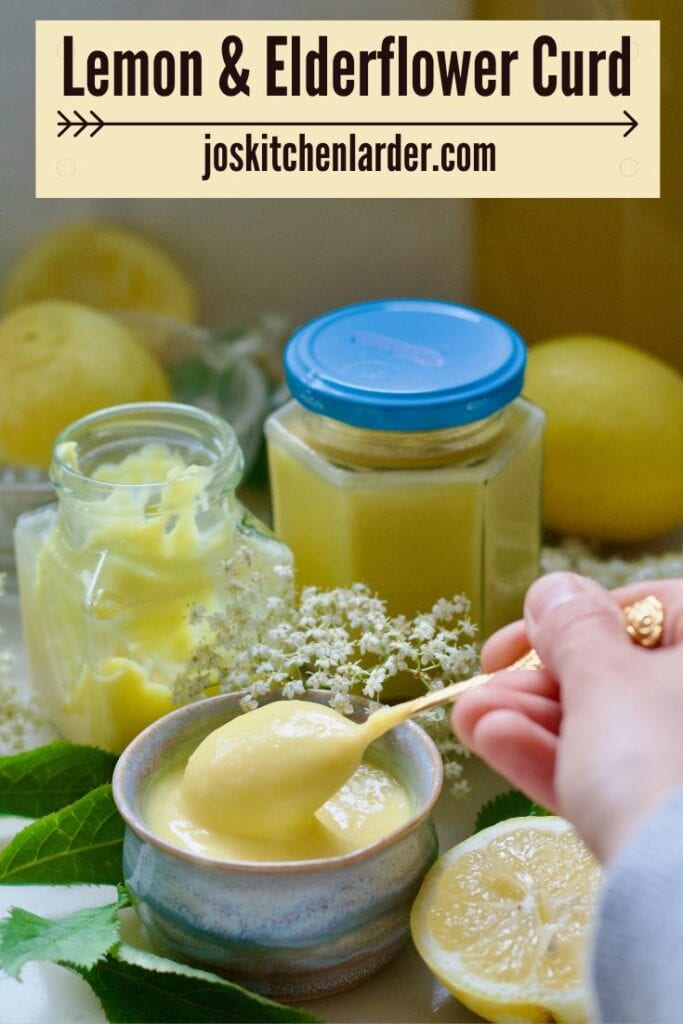 Hand holding a spoon full of elderflower curd.