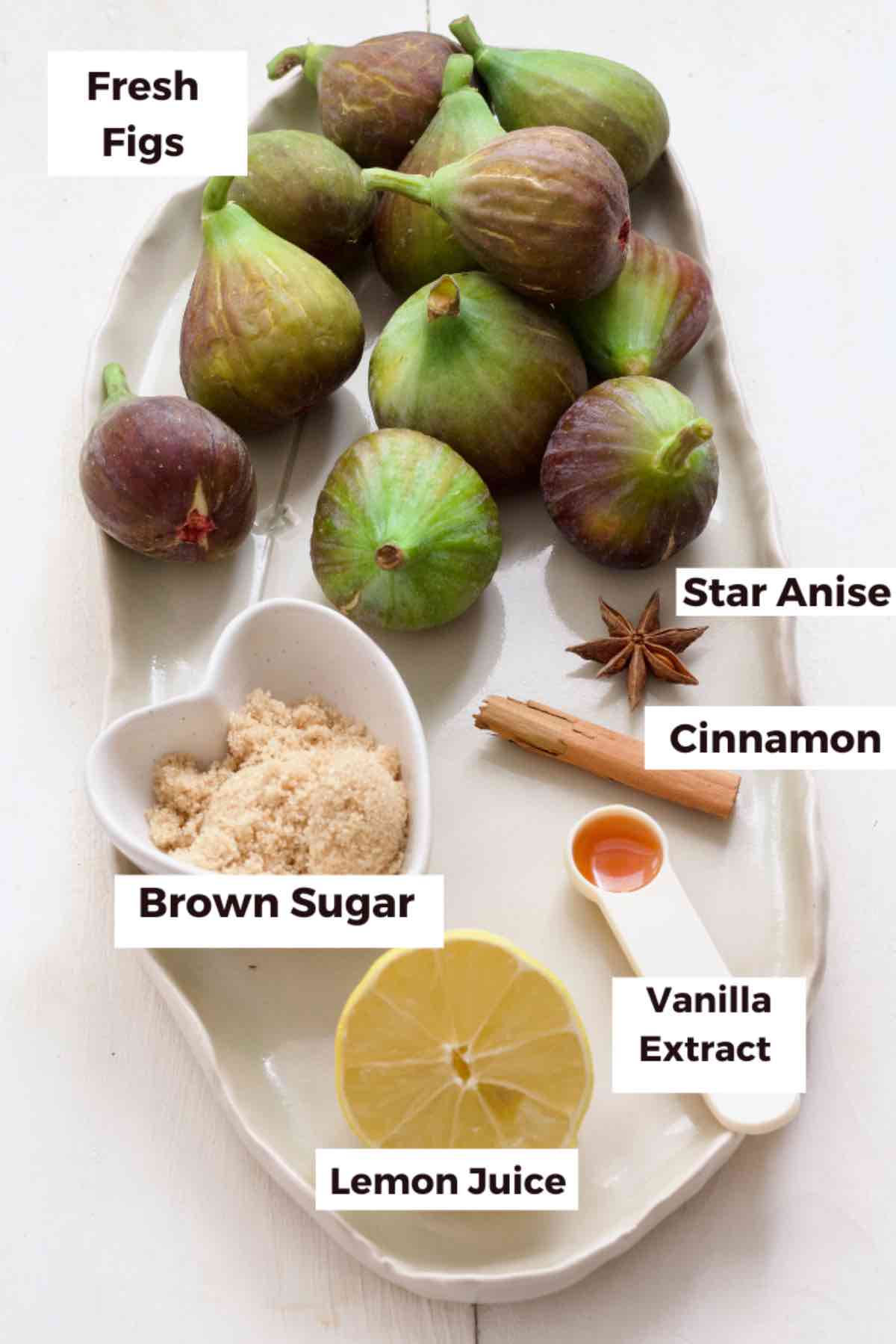 Ingredients for making fig compote on a platter.
