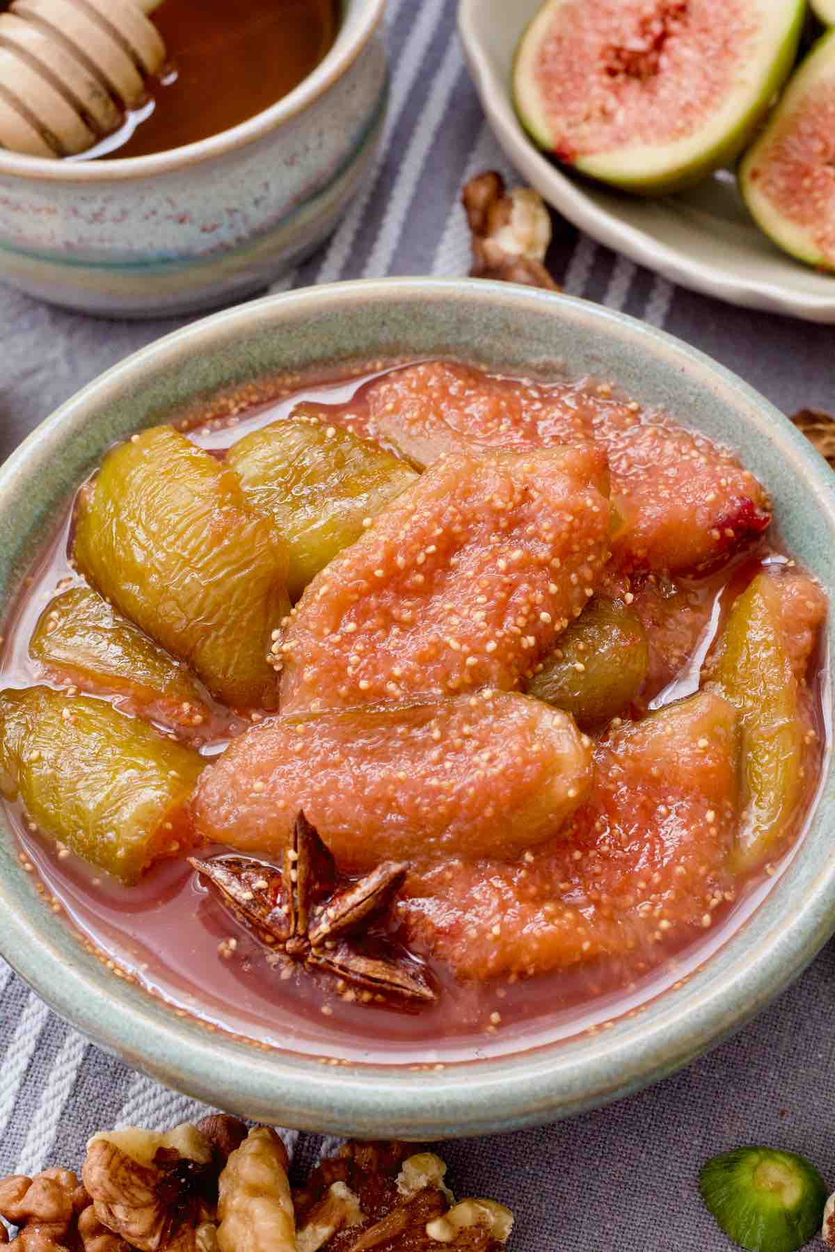 Close up of bowl with fig compote with visible star anise.
