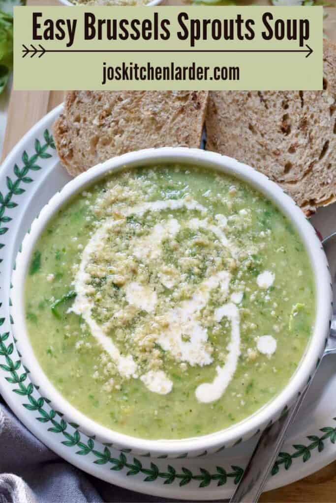Bowl of Brussels sprouts soup with cream and vegan parmesan.
