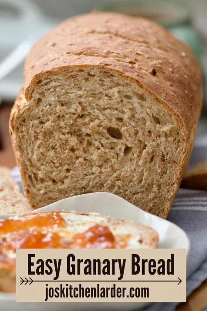 Close up of granary bread loaf showing its crumb.