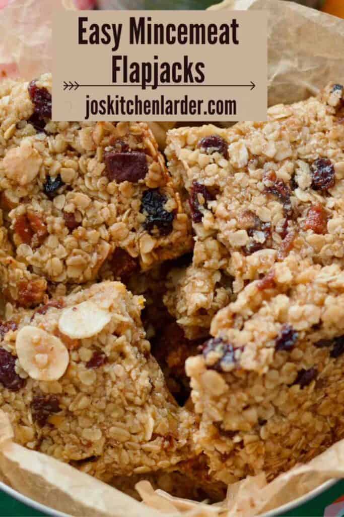 Close up of mincemeat flapjacks in a tin.