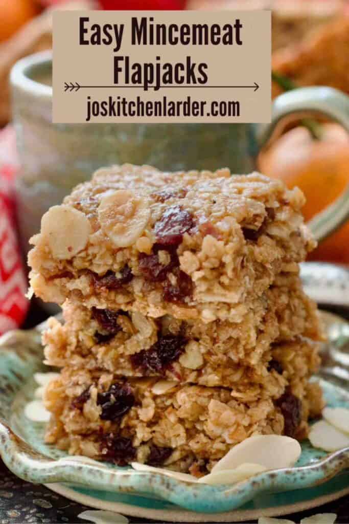 Close up of three flapjacks on a plate.
