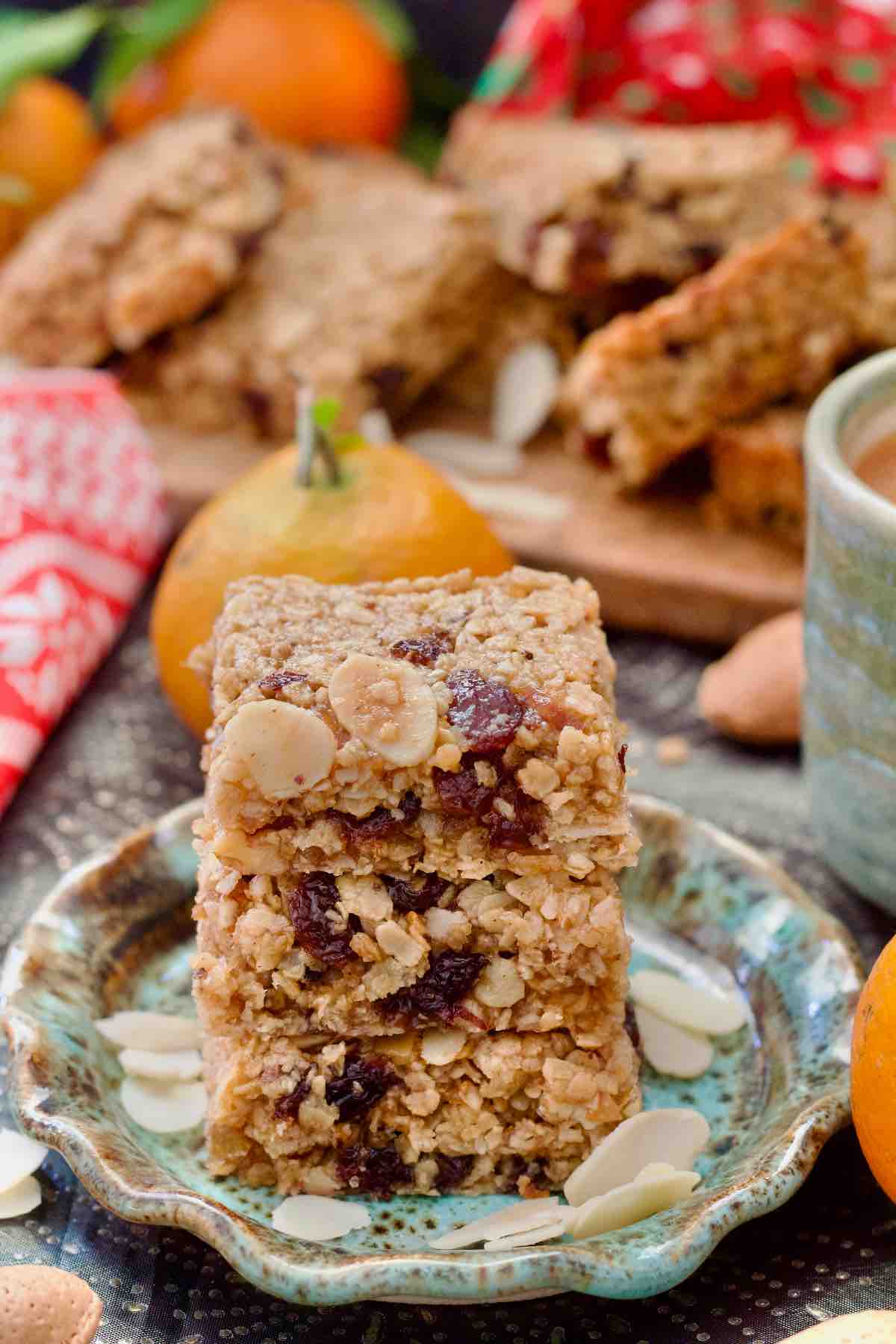 Three mincemeat flapjacks piled up on a small plate.